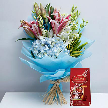 Delicate Flowers and Lindt Chocolate Combo: For Anniversary