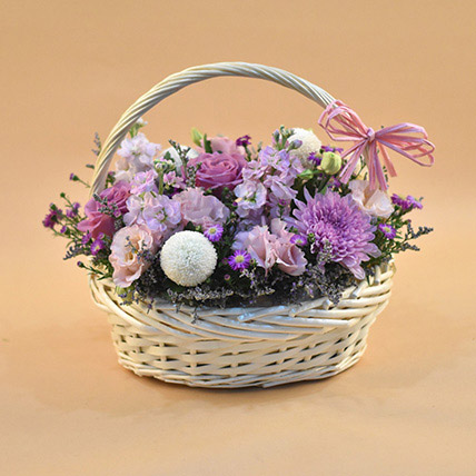 Enticing Mixed Flowers Round Basket: Basket Arrangements 