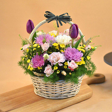 Striking Mixed Flowers Round Basket: Flower Baskets