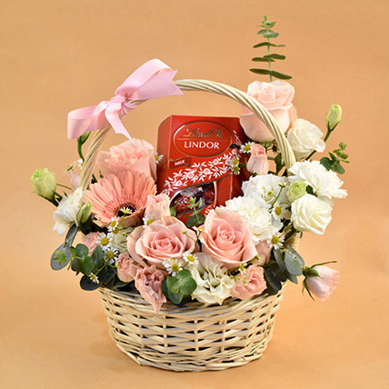 Elegant Flowers & Lindt Chocolate Willow Basket: Flower and Chocolates For Anniversary