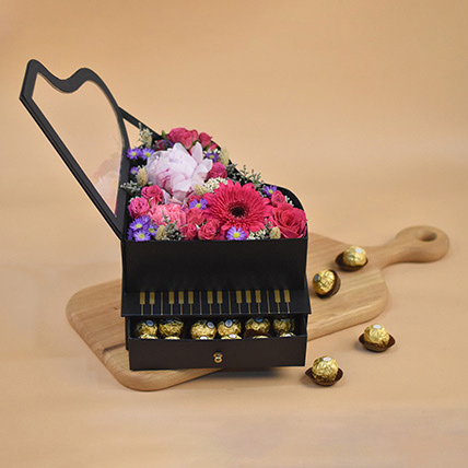 Fresh Blooms N Ferrero Black Piano Box: Flower and Chocolates For Anniversary
