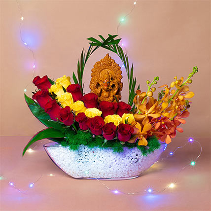Colourful Flowers N Ganesha Idol Ship Shaped Vase: Diwali Gifts