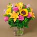 Sparkling Bunch of Flowers In Glass Vase