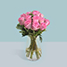 Pink Roses Arrangement In A Glass Vase