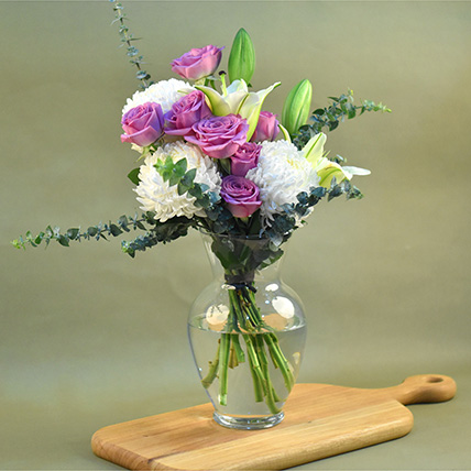 Lovely Mixed Flowers Oval Shaped Vase