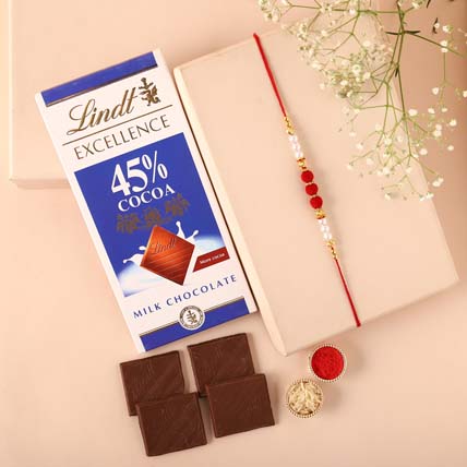 Sneh White Pearl And Velvet Beads Rakhi With Lindt Premium Chocolates