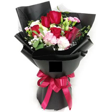 Bouquet of Flowers In Black Wrapped Paper