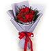 Bouquet of Red Roses In Purple Wrapped Paper