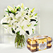 Serene Arranagement Of White Lilies With Ferrero Rocher