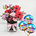 Lovely Mixed Flowers In Glass Vase With Balloons