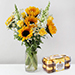 Alluring Mixed Flowers Glass Vase With Chocolate
