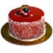 Red Flowers In Glass Vase With Mini Mousse Cake For Valentines