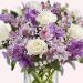 White And Purple Floral Bunch In Glass Vase