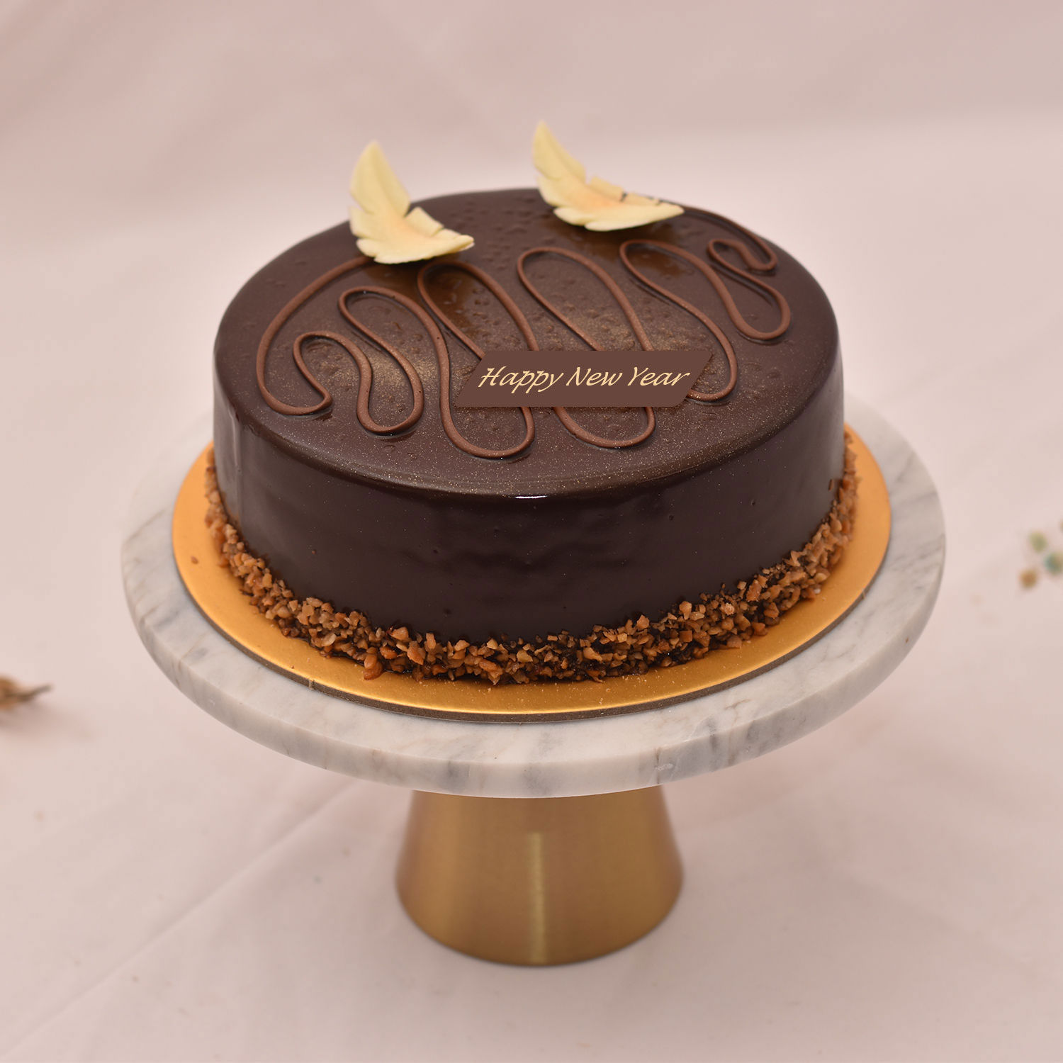 Online Happy New Year Chocolate Cake Gift Delivery in Singapore - Ferns N Petals