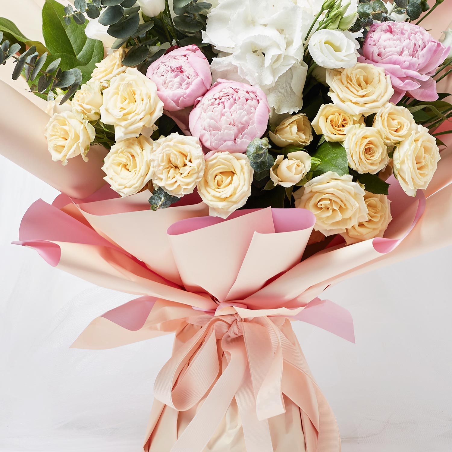 Online Ravishing Mixed Flowers Wrapped Bouquet Gift Delivery in ...