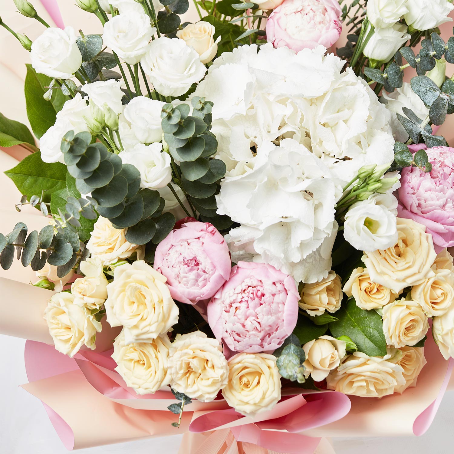 Online Ravishing Mixed Flowers Wrapped Bouquet Gift Delivery In ...