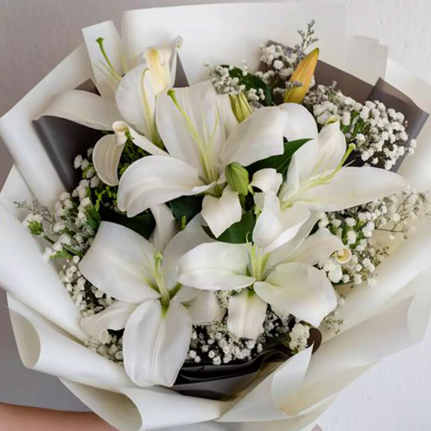 Online Charming White Lilies Bouquet Gift Delivery in Singapore FNP